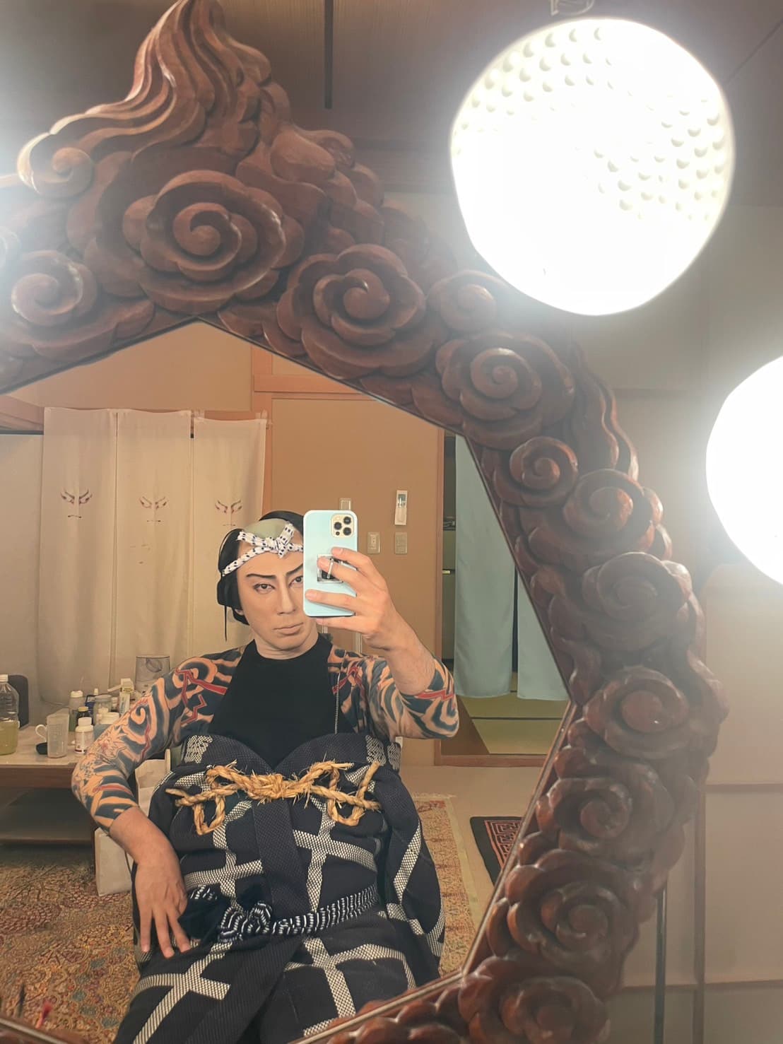 In costume for 'Megumi no Kenka', before the dressing-room mirror